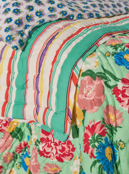 Reversible quilted blanket