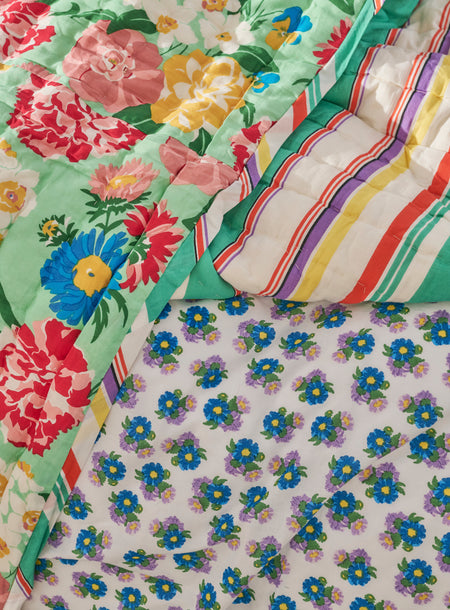 Reversible quilted blanket