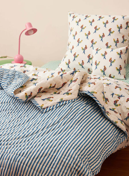 Reversible quilted blanket