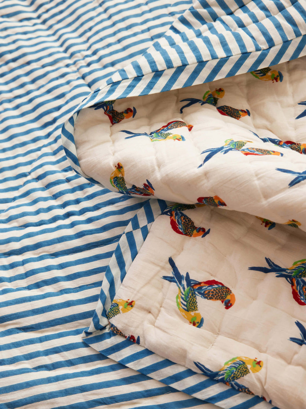 Reversible quilted blanket