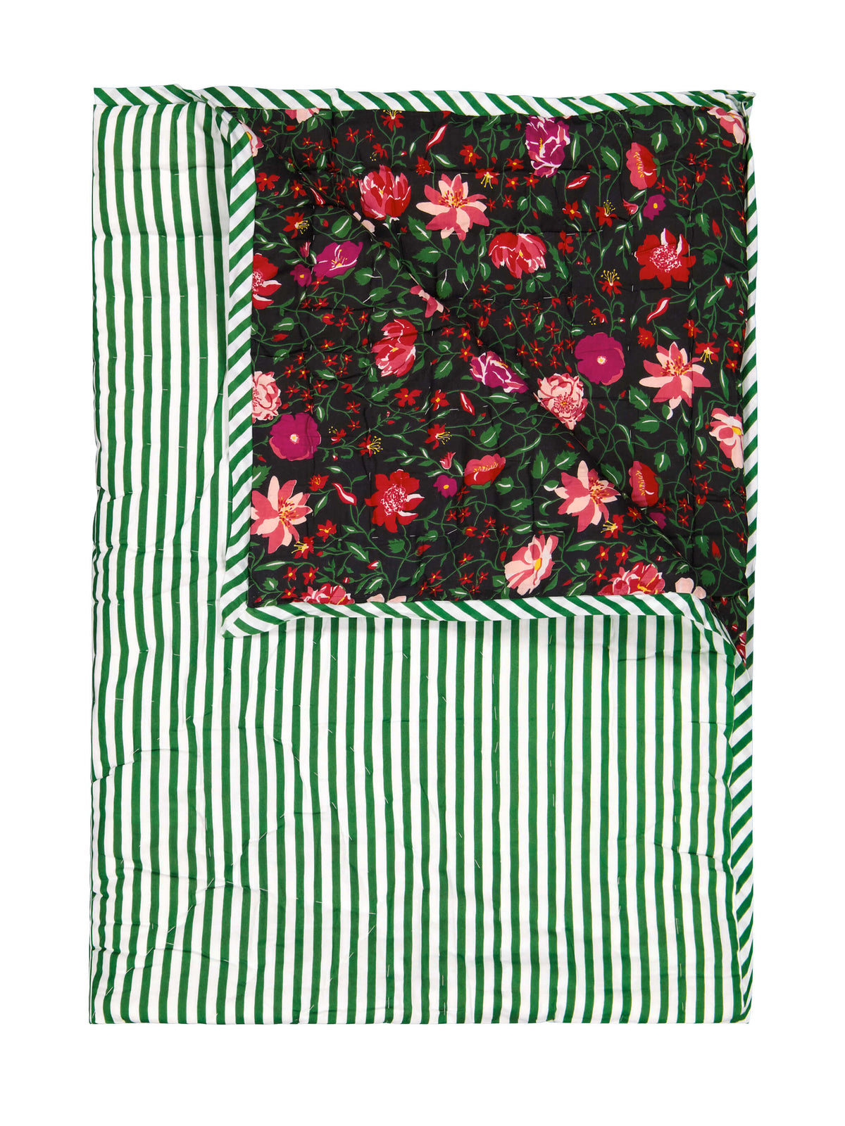 Reversible quilted blanket