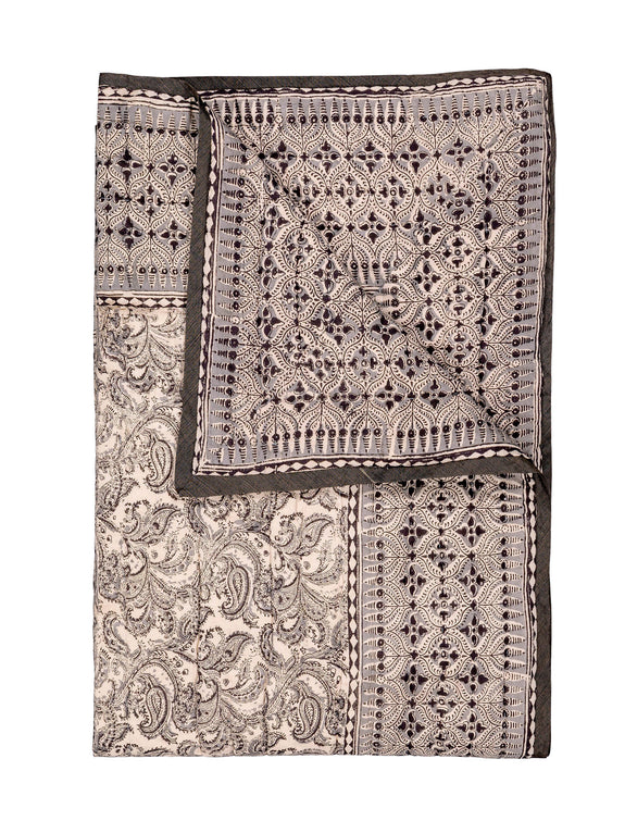 Reversible quilted blanket