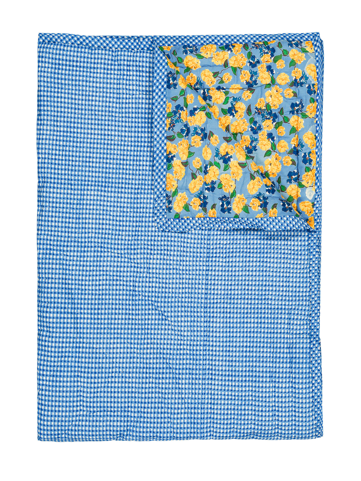 Reversible quilted blanket