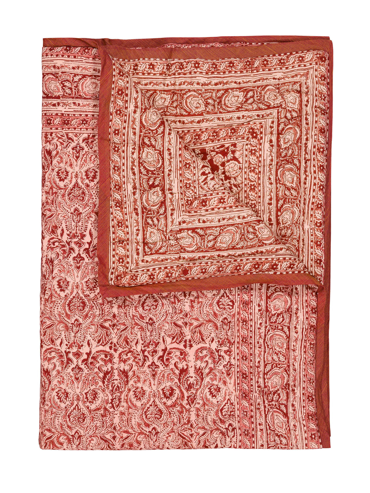 Reversible quilted blanket