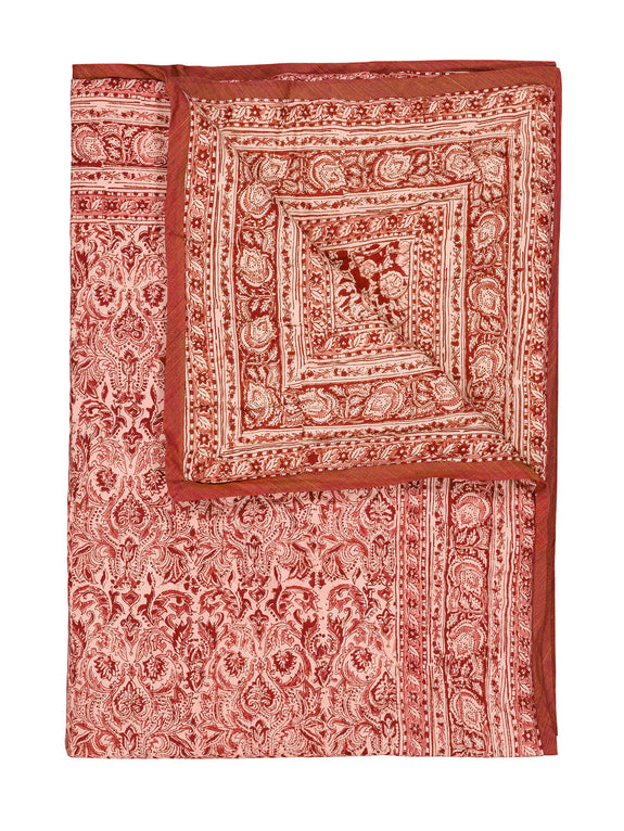 Reversible quilted blanket