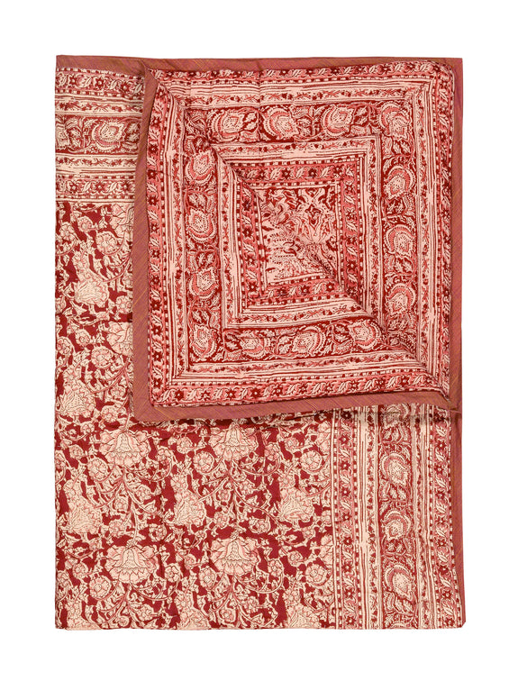 Reversible quilted blanket