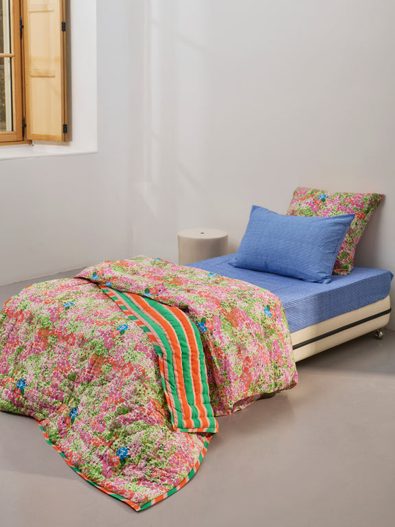 Reversible quilted blanket