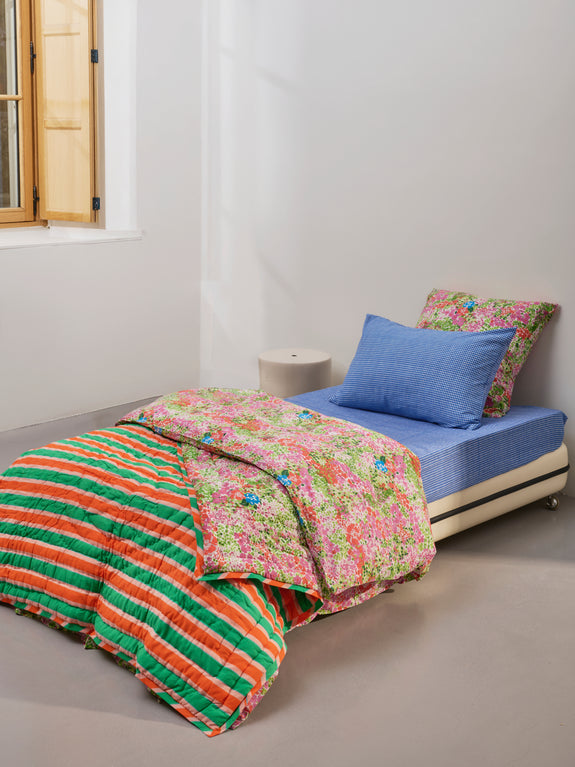 Reversible quilted blanket