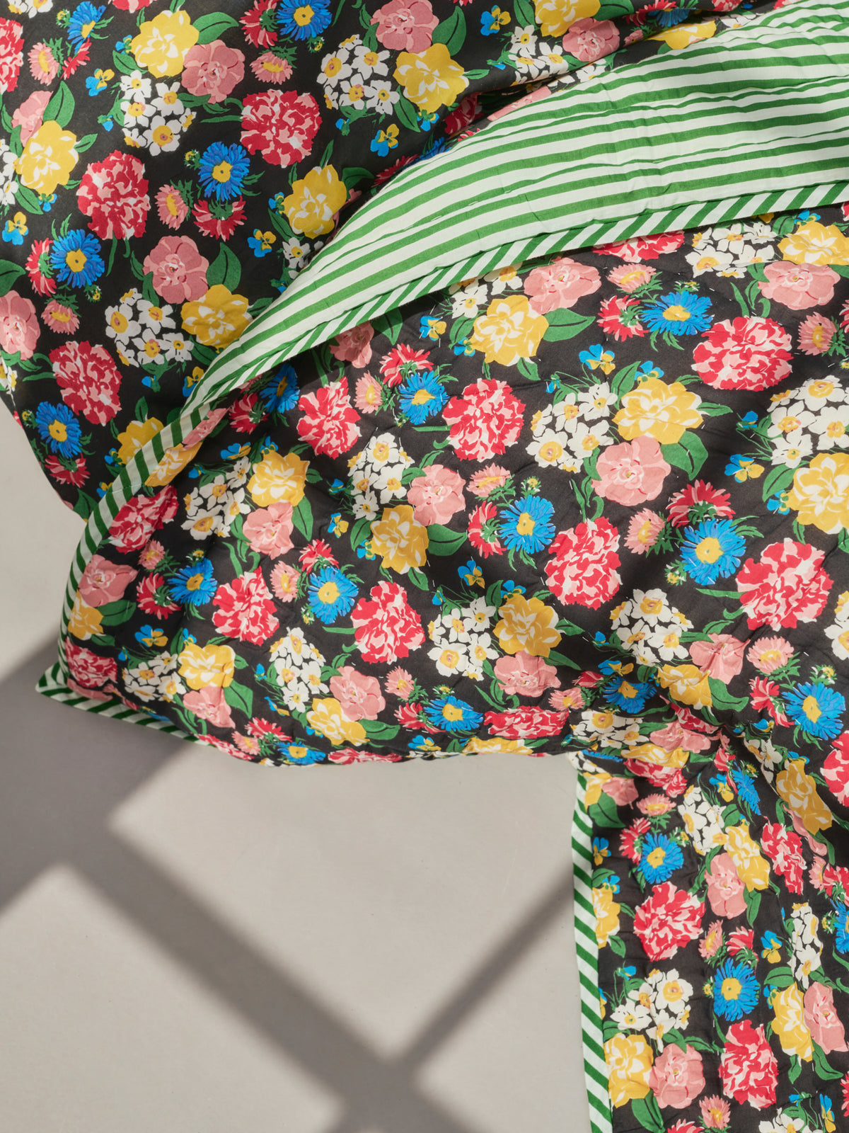 Reversible quilted blanket