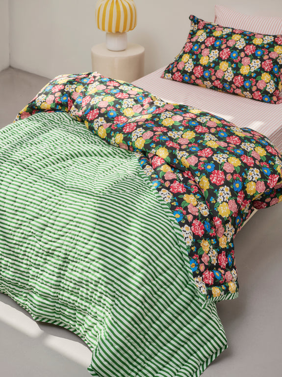 Reversible quilted blanket