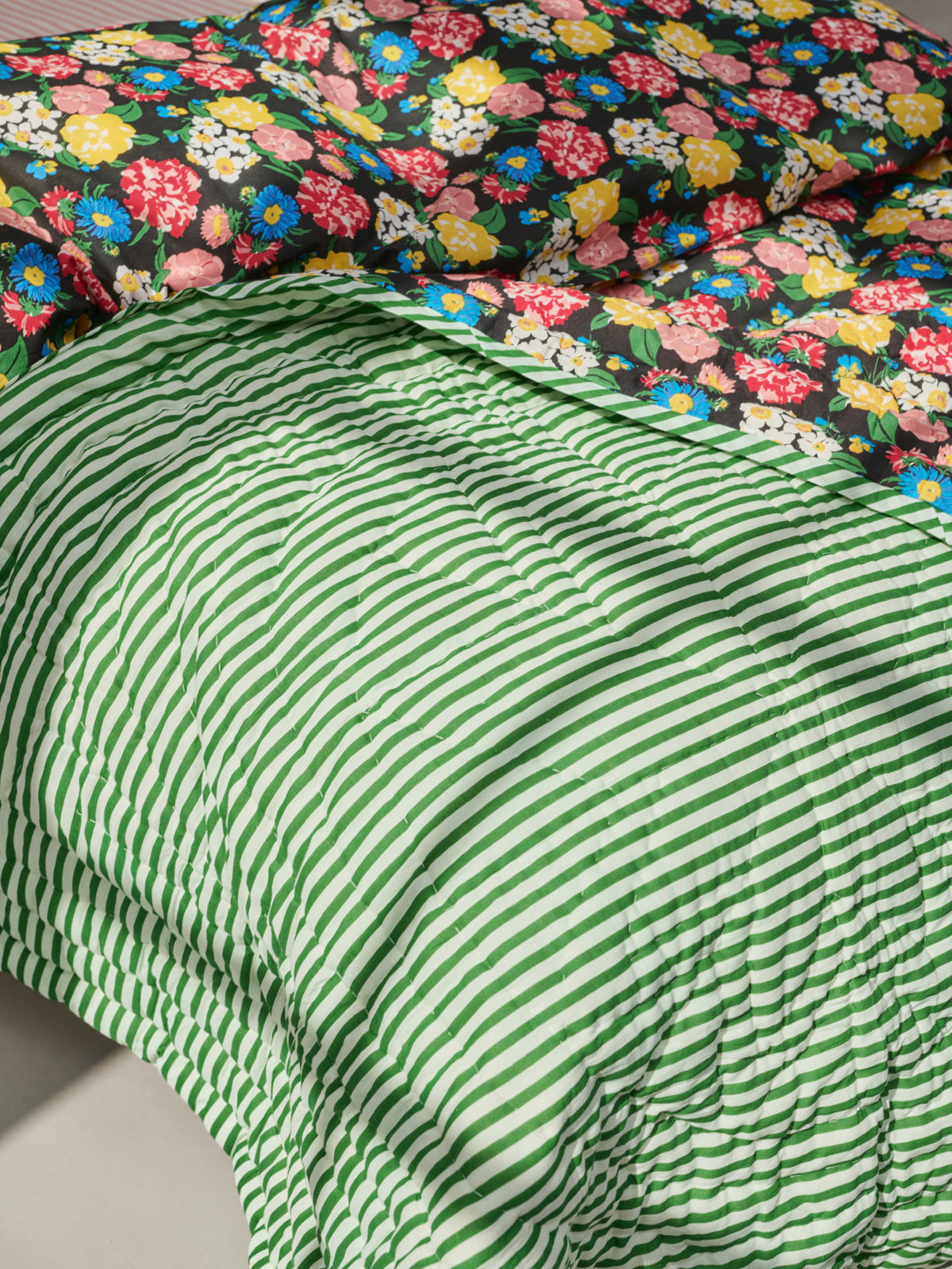 Reversible quilted blanket