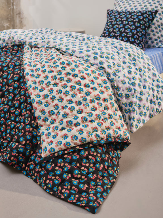 Reversible quilted blanket