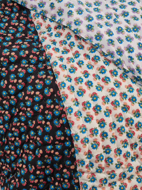 Reversible quilted blanket