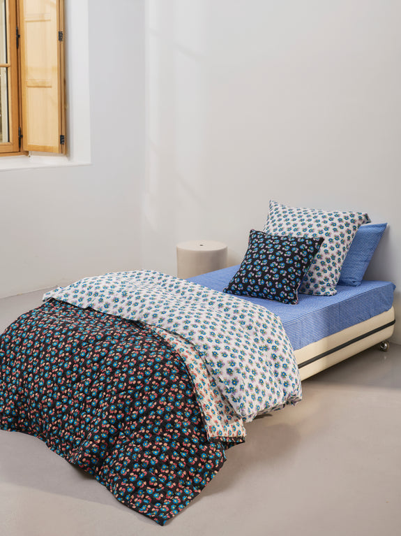 Reversible quilted blanket