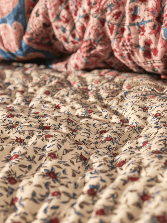 Reversible quilted blanket