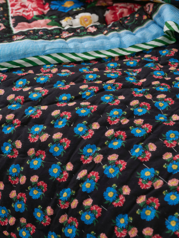 Reversible quilted blanket