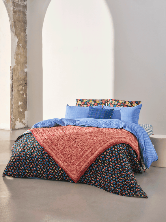 Reversible quilted blanket