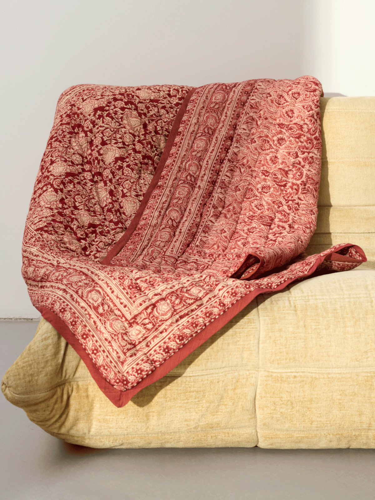 Reversible quilted blanket