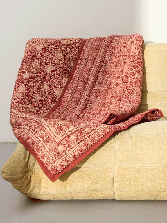 Reversible quilted blanket