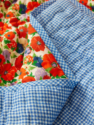 Plaid matelassé réversible en situation