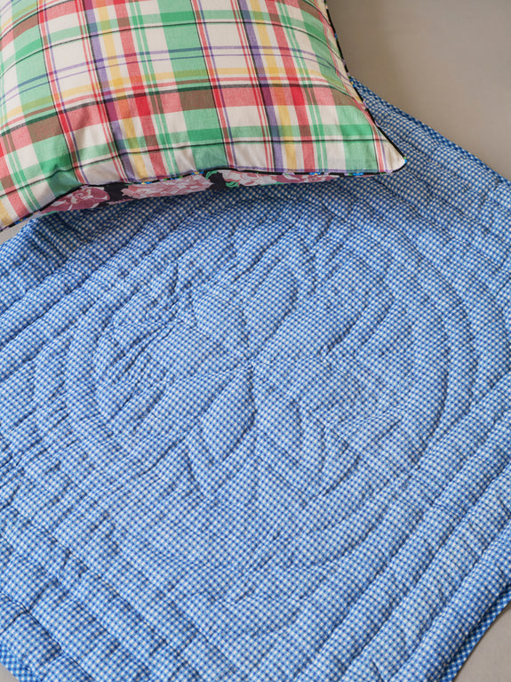 Reversible quilted play mat