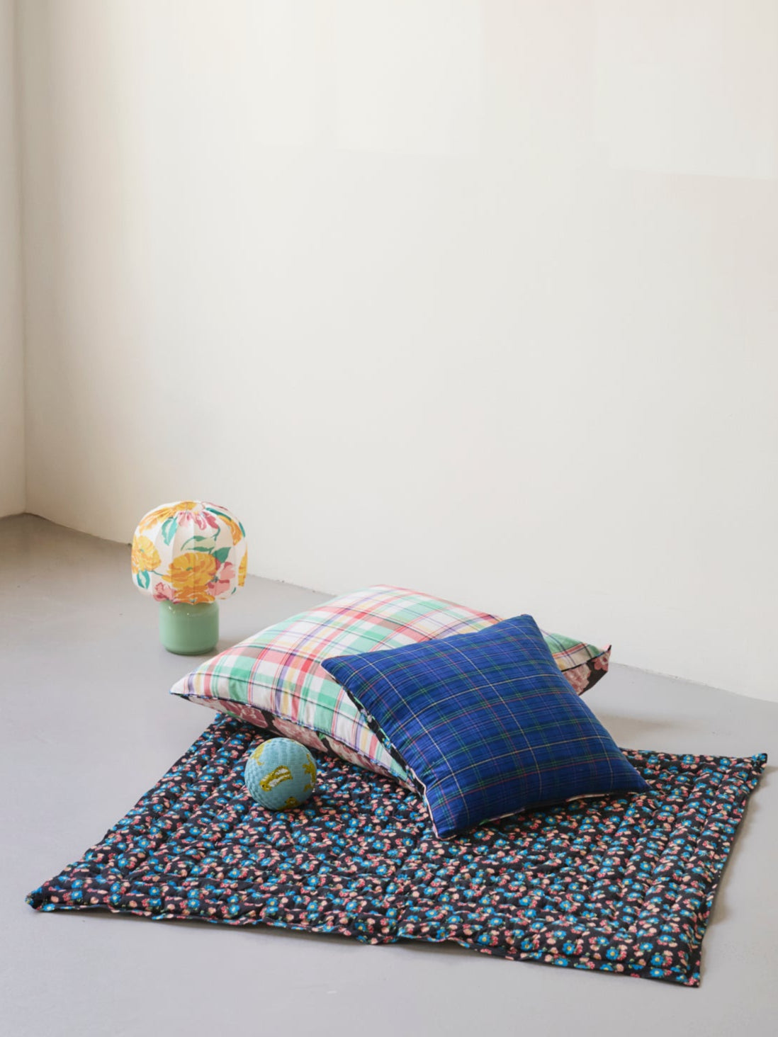 Reversible quilted play mat