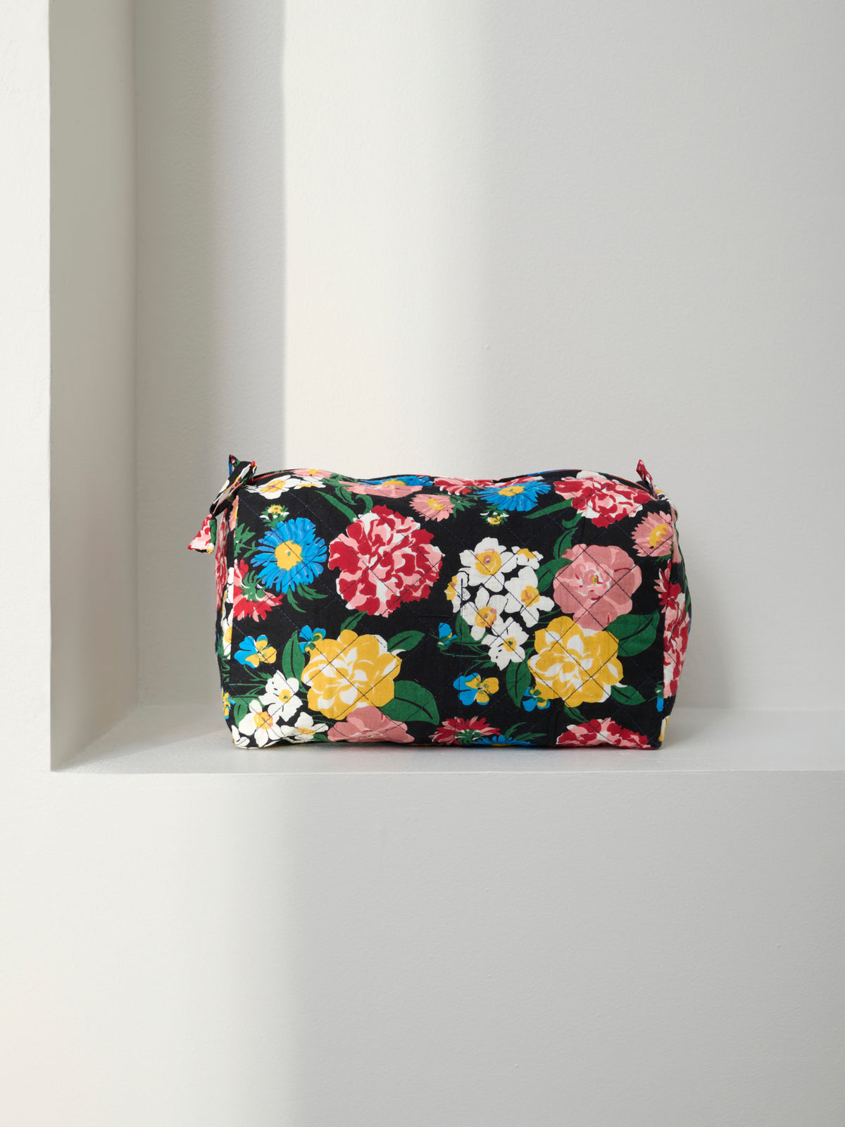 Trousse de toilette matelassée ronde