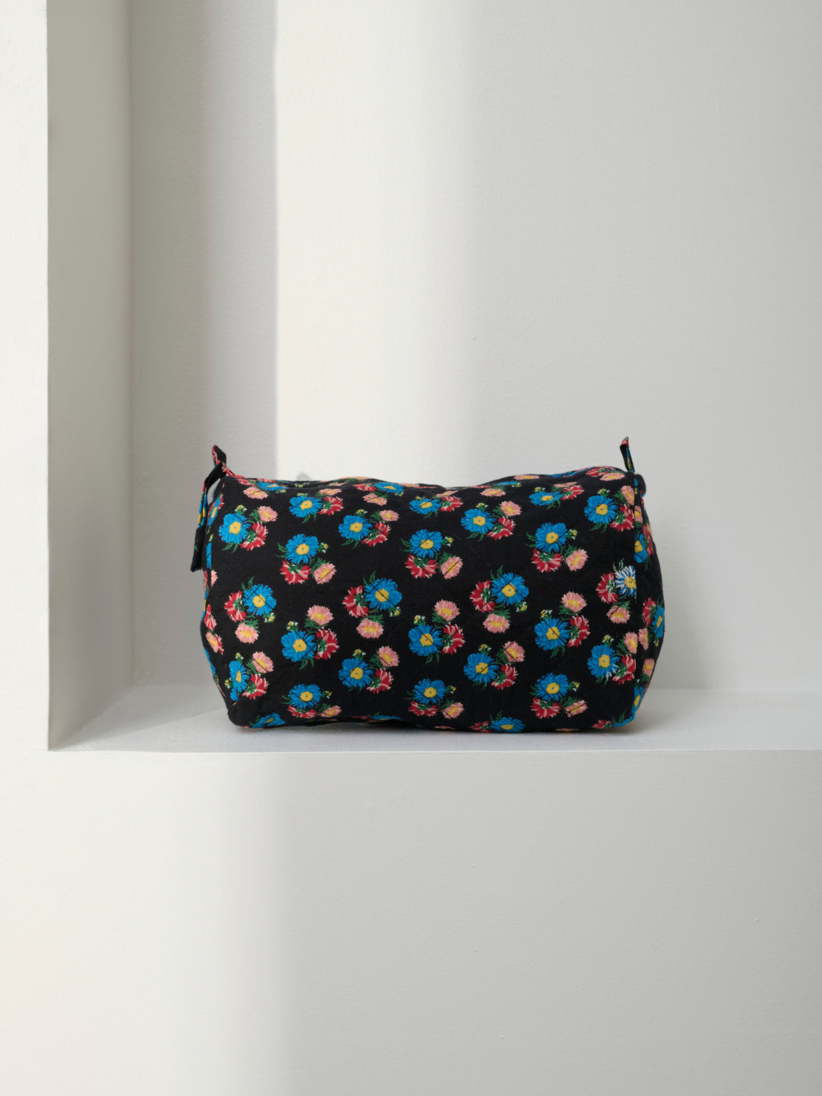 Trousse de toilette matelassée ronde