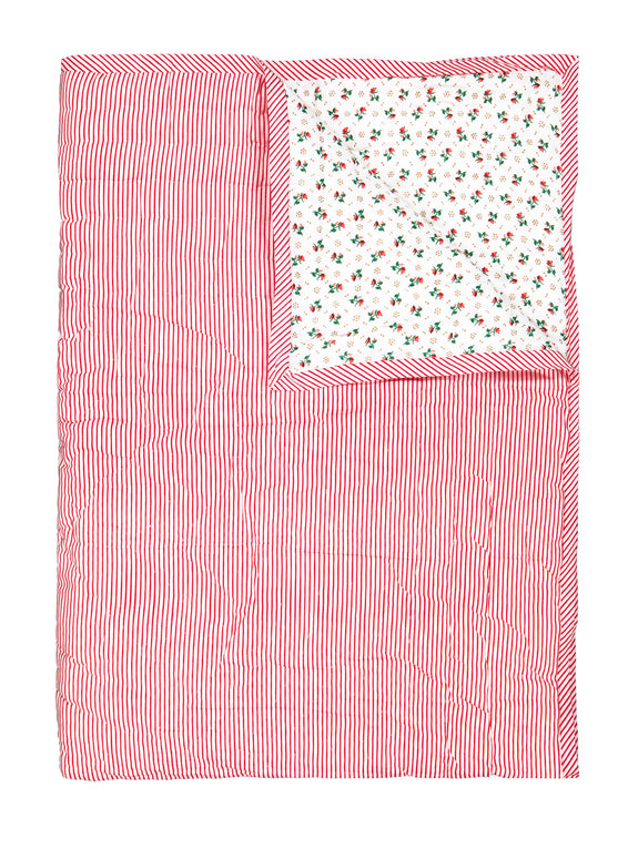Reversible quilted blanket